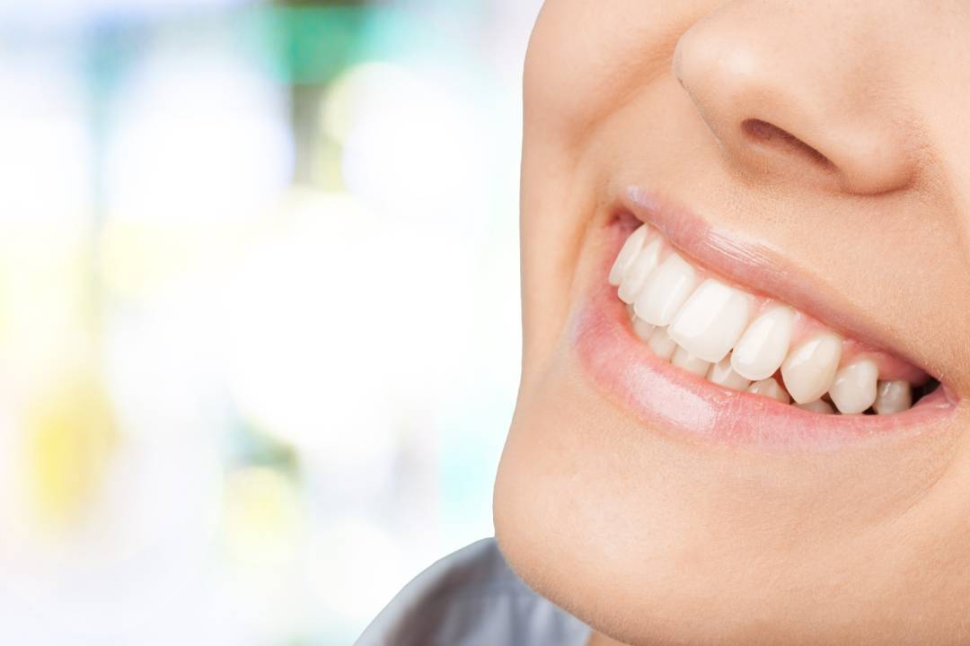 Healthy smile achieved through proper airway health, nutrition, and dental structure.
